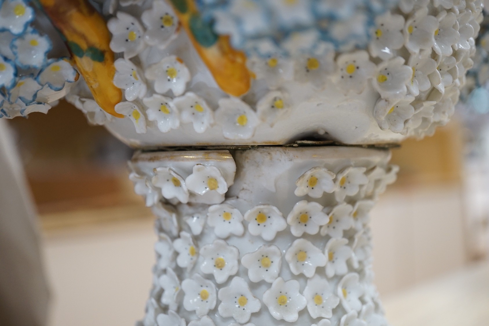 A large 19th century Jacob Petit floral encrusted two handled vase and cover, decorated with birds and flowers, 64cms high